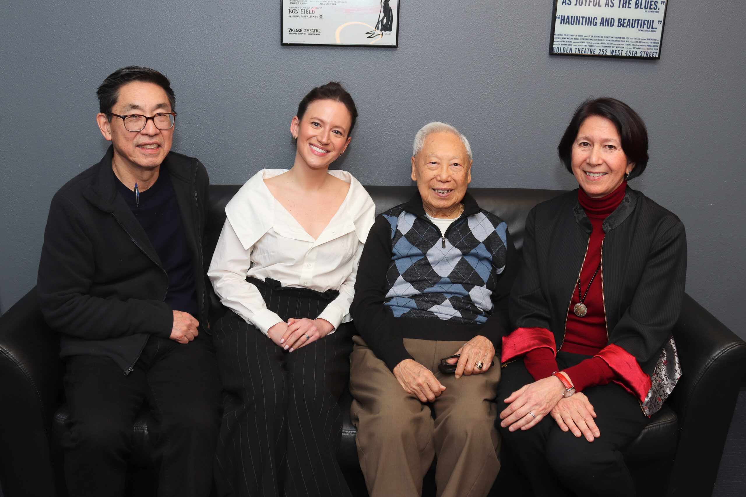 Producers sit and pose with George Lee